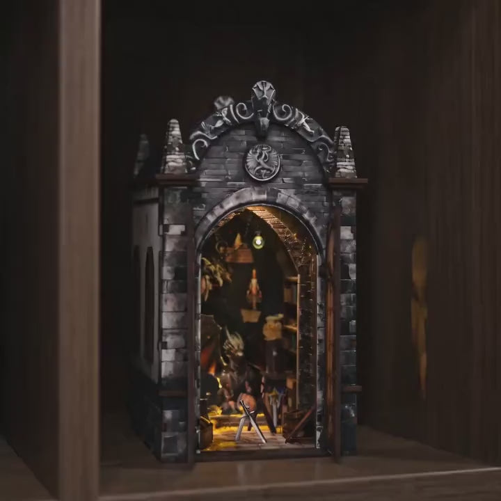 The Dragon's Keep book nook showcase, warm interior glowing to life
