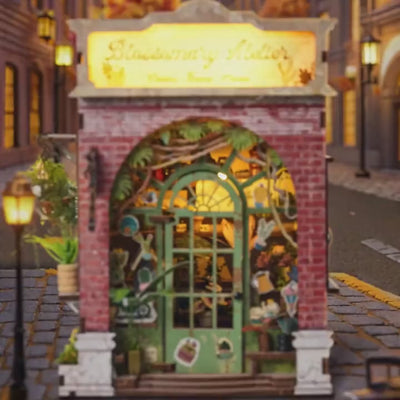 The Blossom House miniature red-brick florist book nook, lit product showcase