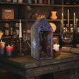 The Arcane Tower DIY book nook showcase, interior lights glowing warm in a wizard study tower