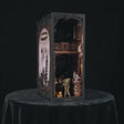 The Darkroom book nook lighting up, a calm product showcase of the vintage photographer's studio