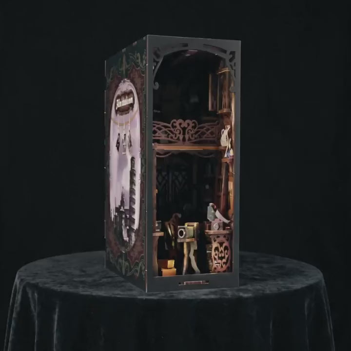 The Darkroom book nook lighting up, a calm product showcase of the vintage photographer's studio