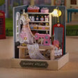 The Sewing Corner DIY miniature roombox showcase, lights glowing warm