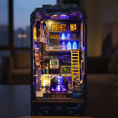 Hands assembling The Neon Reactor book nook, ending with the lights switching on
