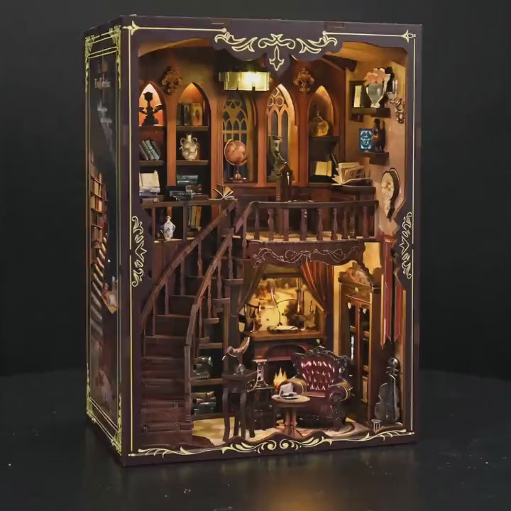The Cathedral Library DIY book nook kit showcase, warm interior lights glowing