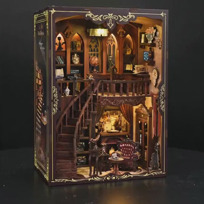 The Cathedral Library DIY book nook kit showcase, warm interior lights glowing
