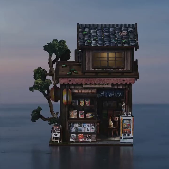 The Corner Store miniature roombox lighting up at dusk, a calm product showcase