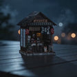 The Izakaya miniature pub showcase, lights glowing to life
