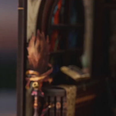 The Potion Workshop miniature roombox showcase, lights glowing to life