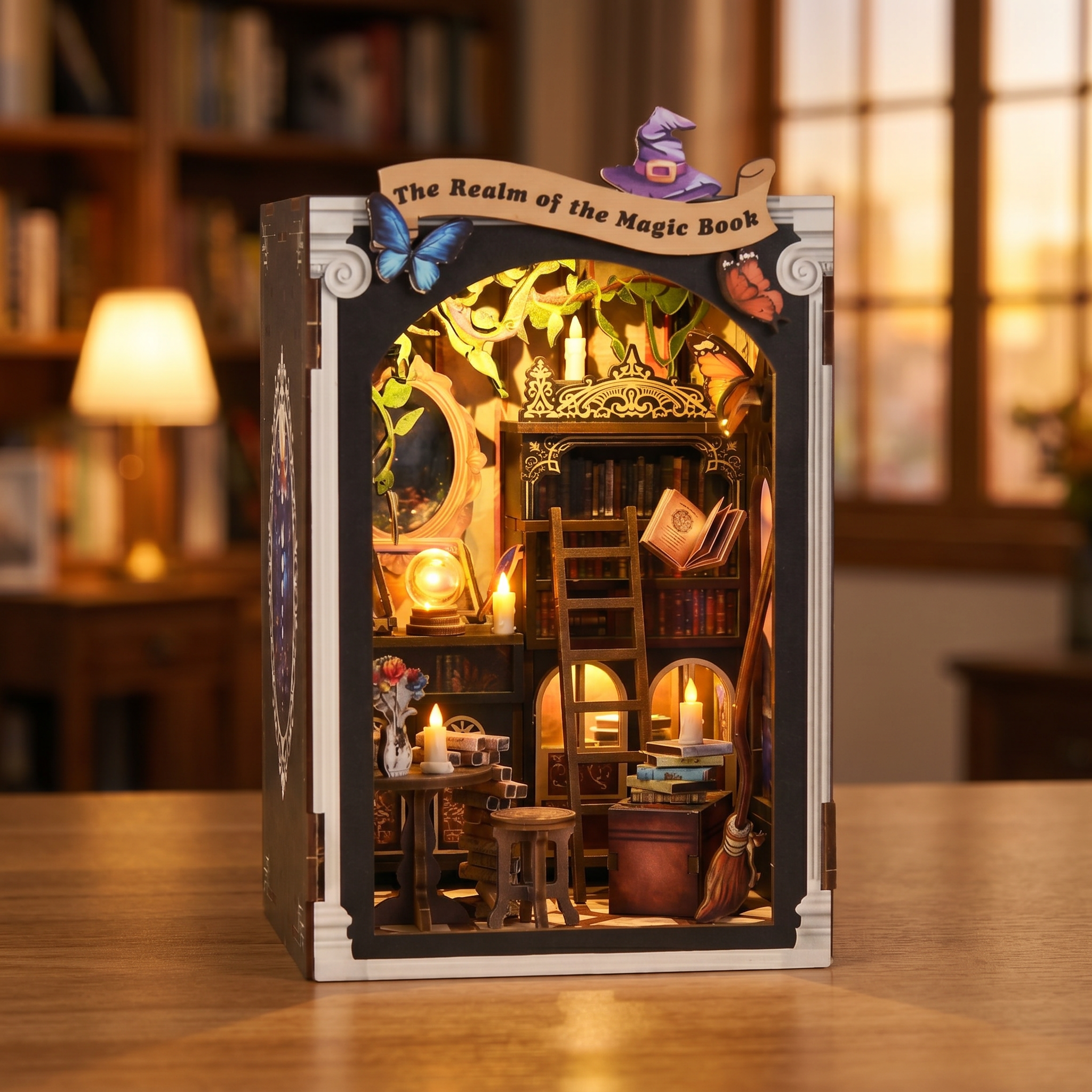 The Spellbound Library showcase, warm interior lights glow to life across the wizard's magic library