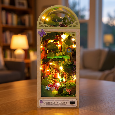 The Firefly Forest book nook lighting up at dusk