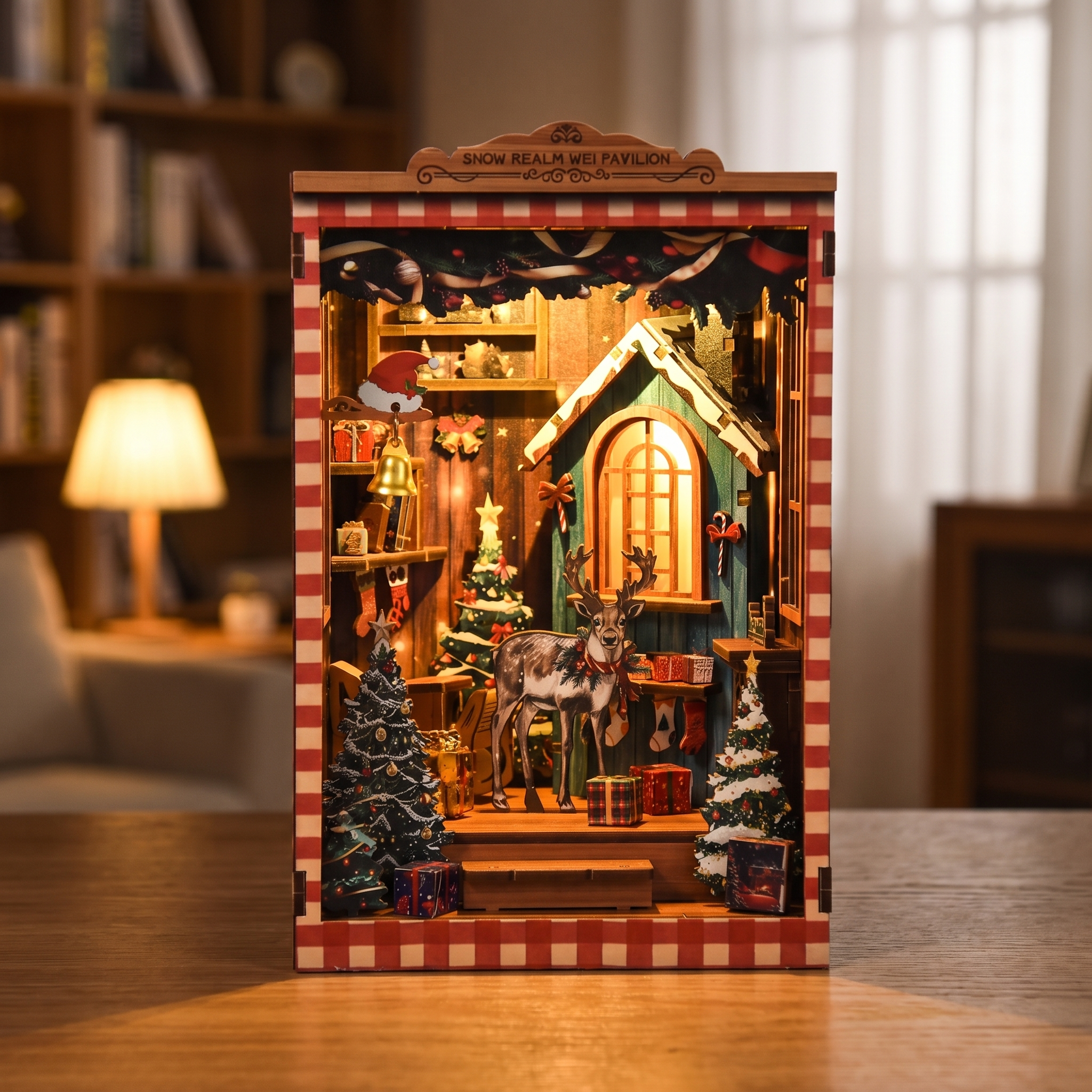 The Snow Cabin DIY book nook showcase, the cabin window glows warm as snow drifts