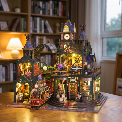 Hands assembling The Clocktower Emporium kit, LED lights turning on