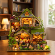 Hands assembling The Mossgrove Cottage kit, LED lights turning on