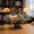 Hands assembling The Orbital Outpost model, ending with the lights switching on