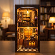 Assembling The Bewitched Bean book nook by hand, lights on at the end