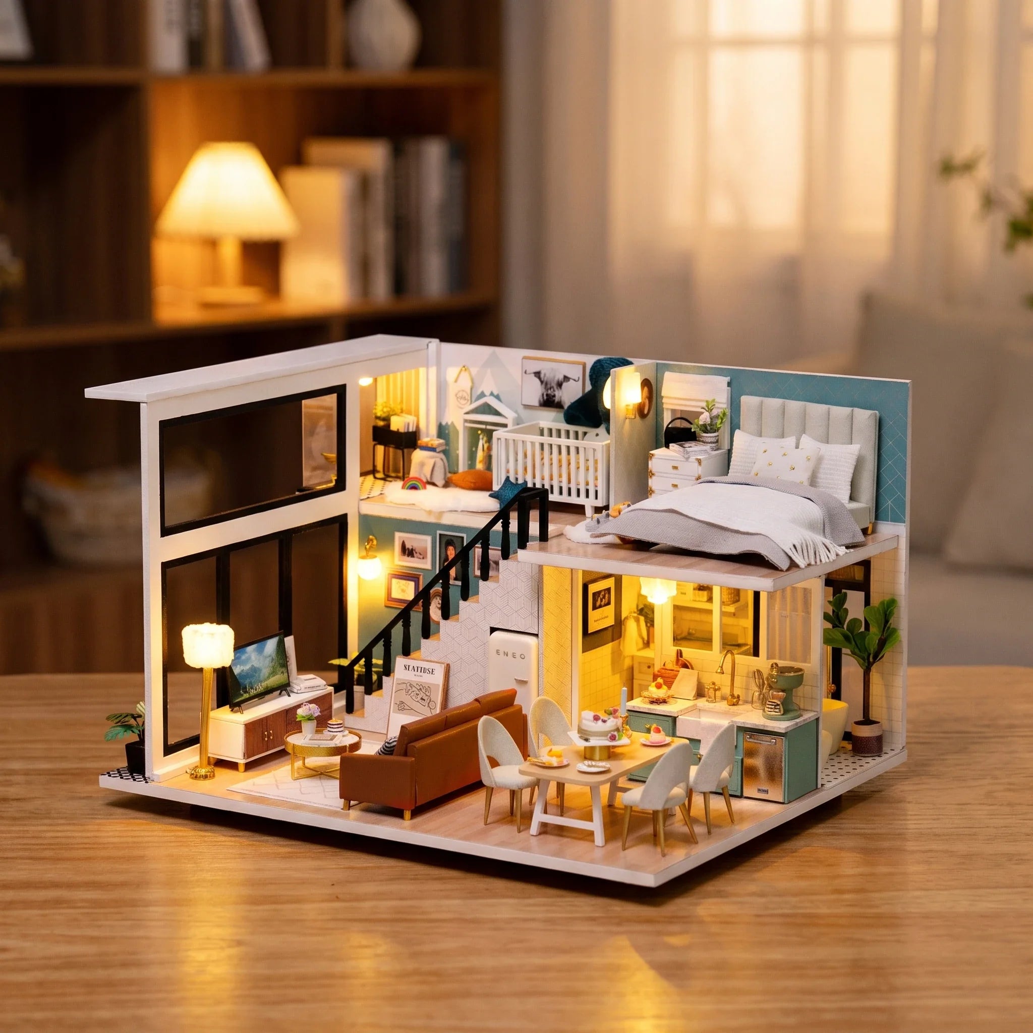 Hands assembling The Lullaby Loft miniature kit, ending with the lights switching on
