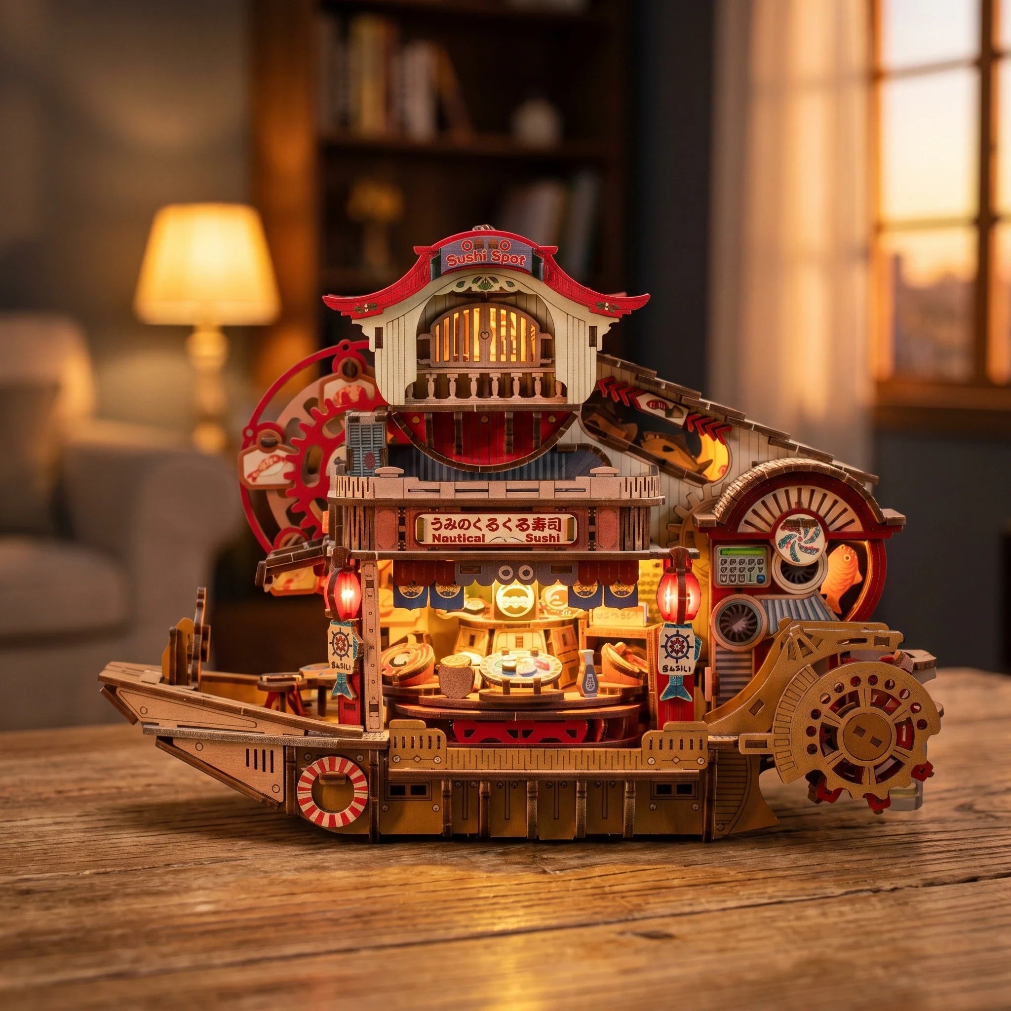 Hands assembling The Sushi Wheelhouse, ending with the paddle wheel turning and the lights on