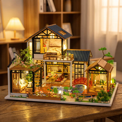 Assembling The Swan Garden villa by hand, garden lit at the end