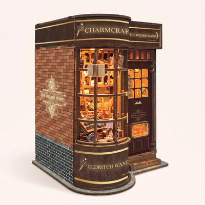The Wand Shop book nook showcase, warm lights glowing to life over shelves of wand boxes