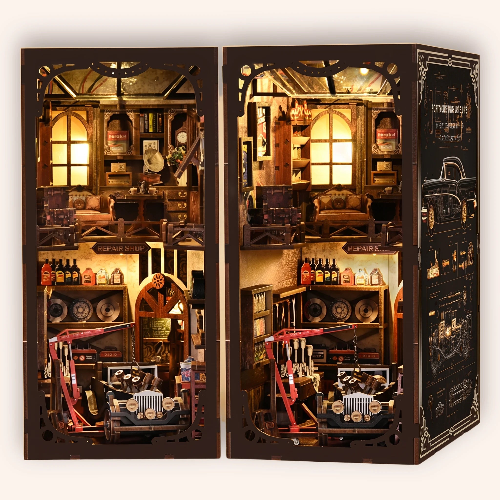The Repair Shop DIY book nook kit on a cream background, lights on