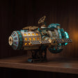 The Orbital Outpost glowing on a walnut shelf at night