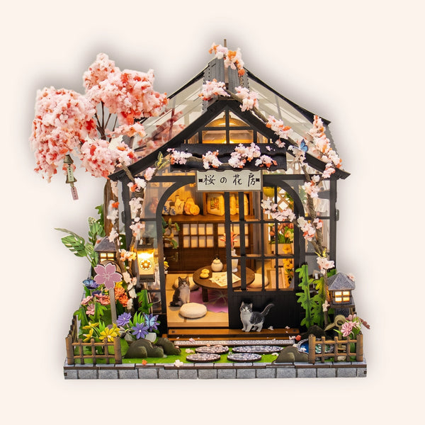 The Sakura Teahouse DIY miniature cherry blossom greenhouse kit on a cream background