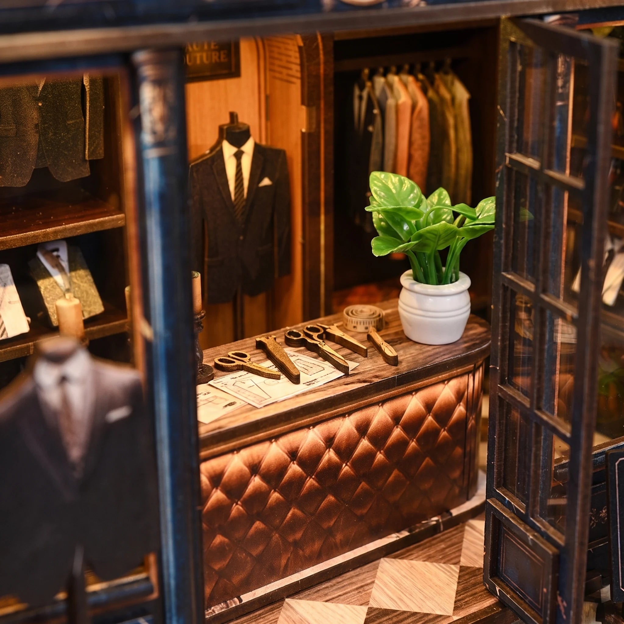 The Tailor's Atelier counter and workbench with tiny wooden tools and printed details