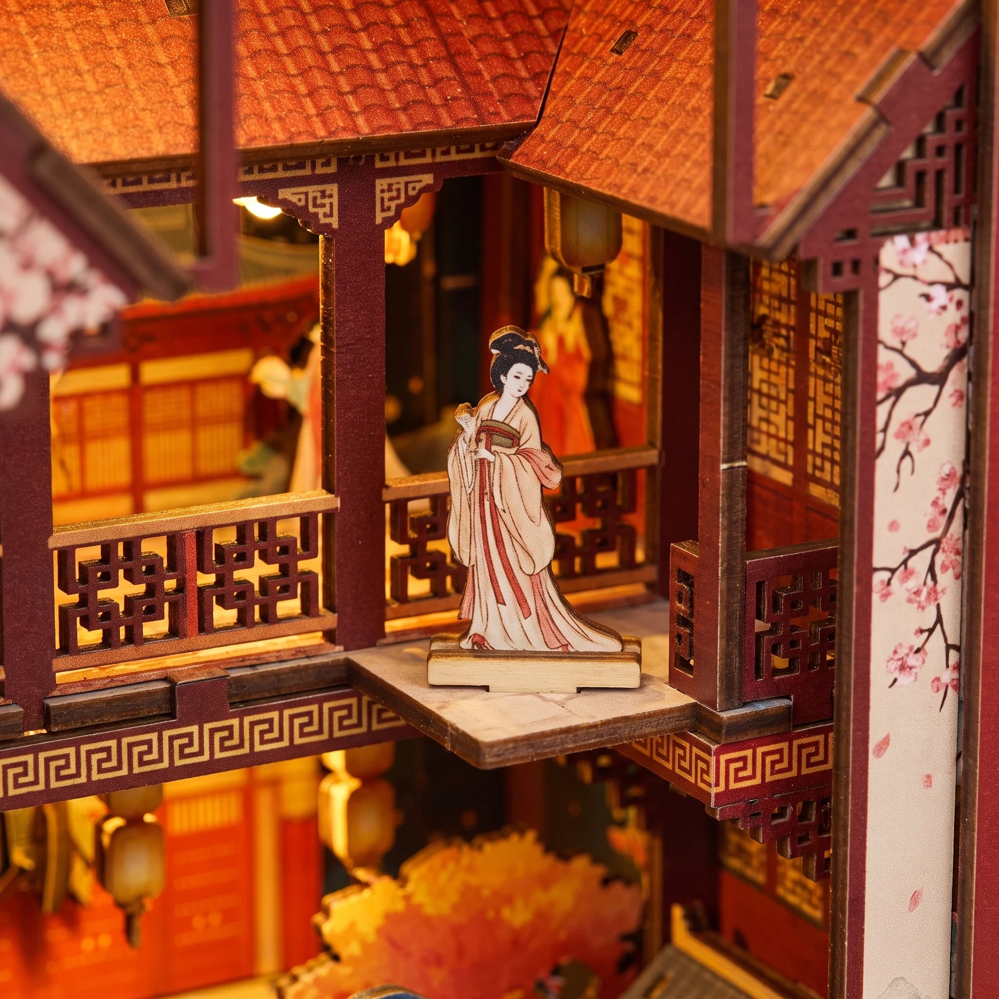 The Tang Palace upper balcony with a printed figure panel beside red lattice railings
