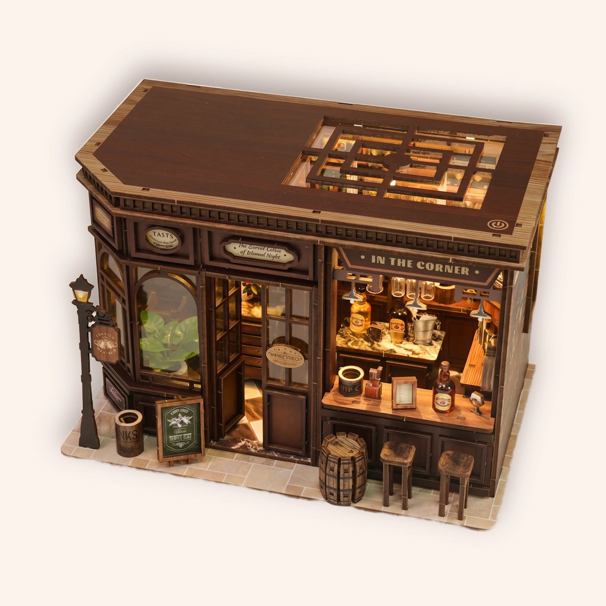The Hidden Tavern miniature book nook on a cream background