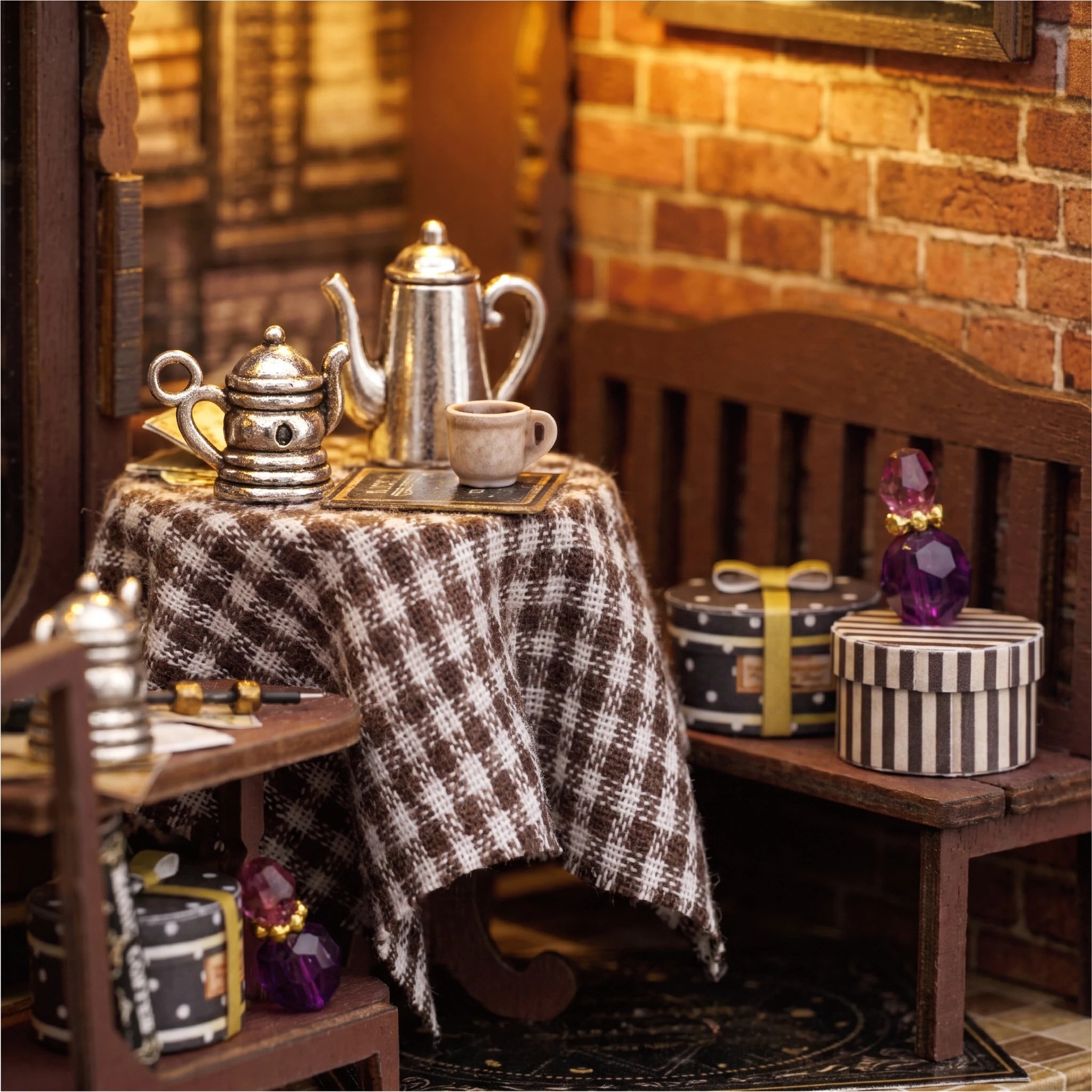 Sitting corner detail: checked tablecloth and silver kettle