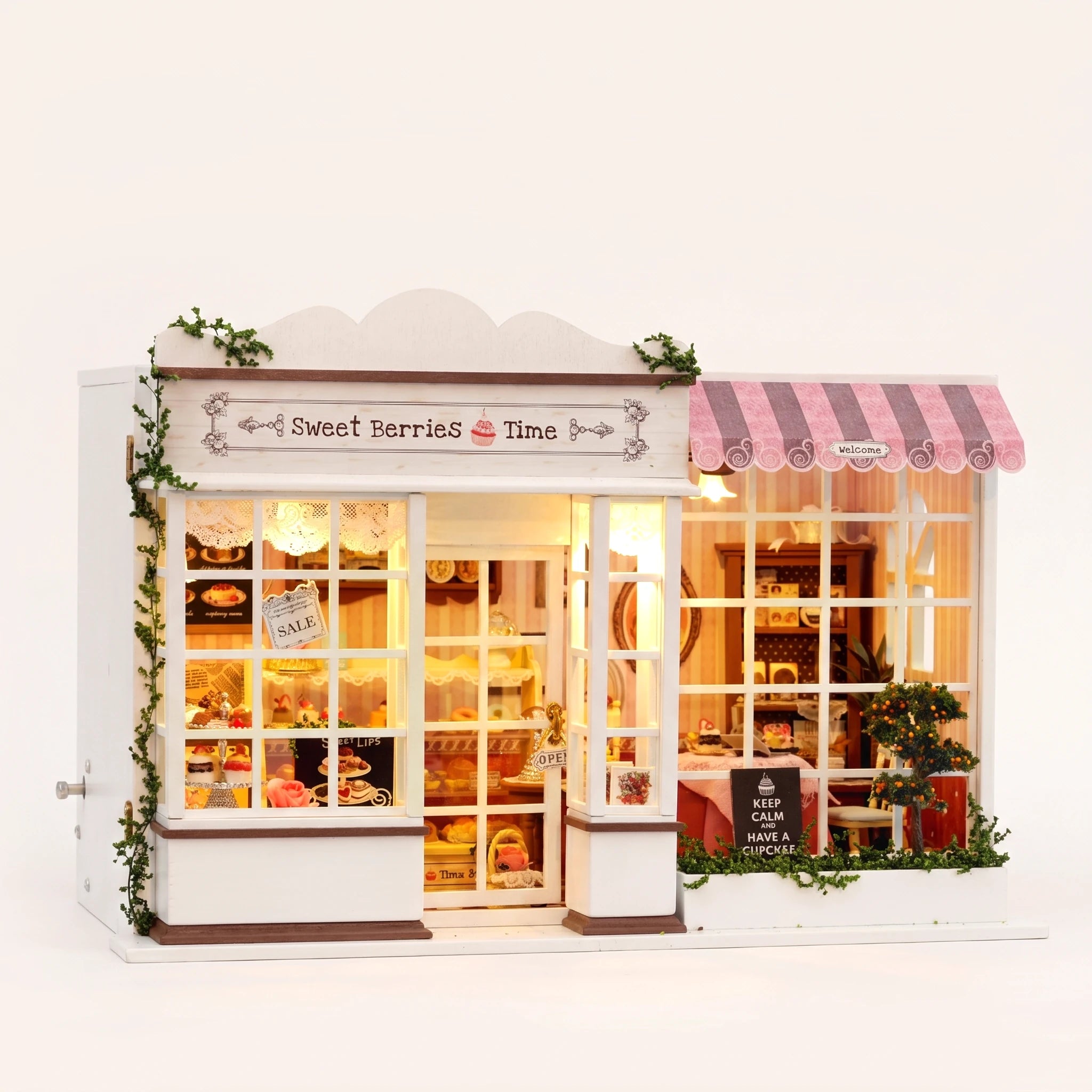 The Berry Bakehouse DIY miniature bakery kit, assembled with LED lights on