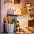 Counter corner detail: baguette basket and strawberry vine