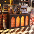 Macro of the brick espresso counter with glowing arched windows