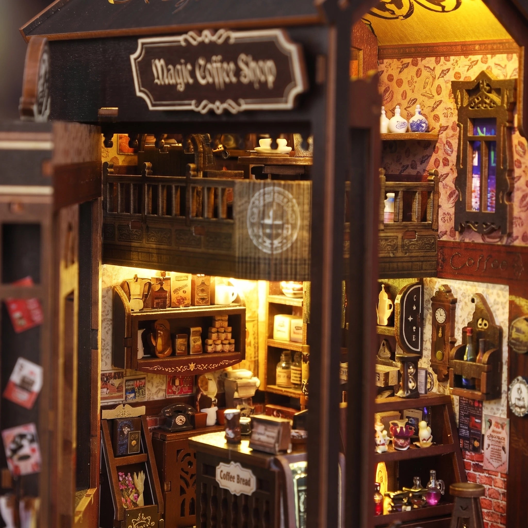 Macro of the lamplit shopfront of The Bewitched Bean