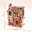 The Candy Cane Cottage assembled size: 7.5 x 6.3 x 4.3 inches (19.1 x 16.0 x 10.9 cm)