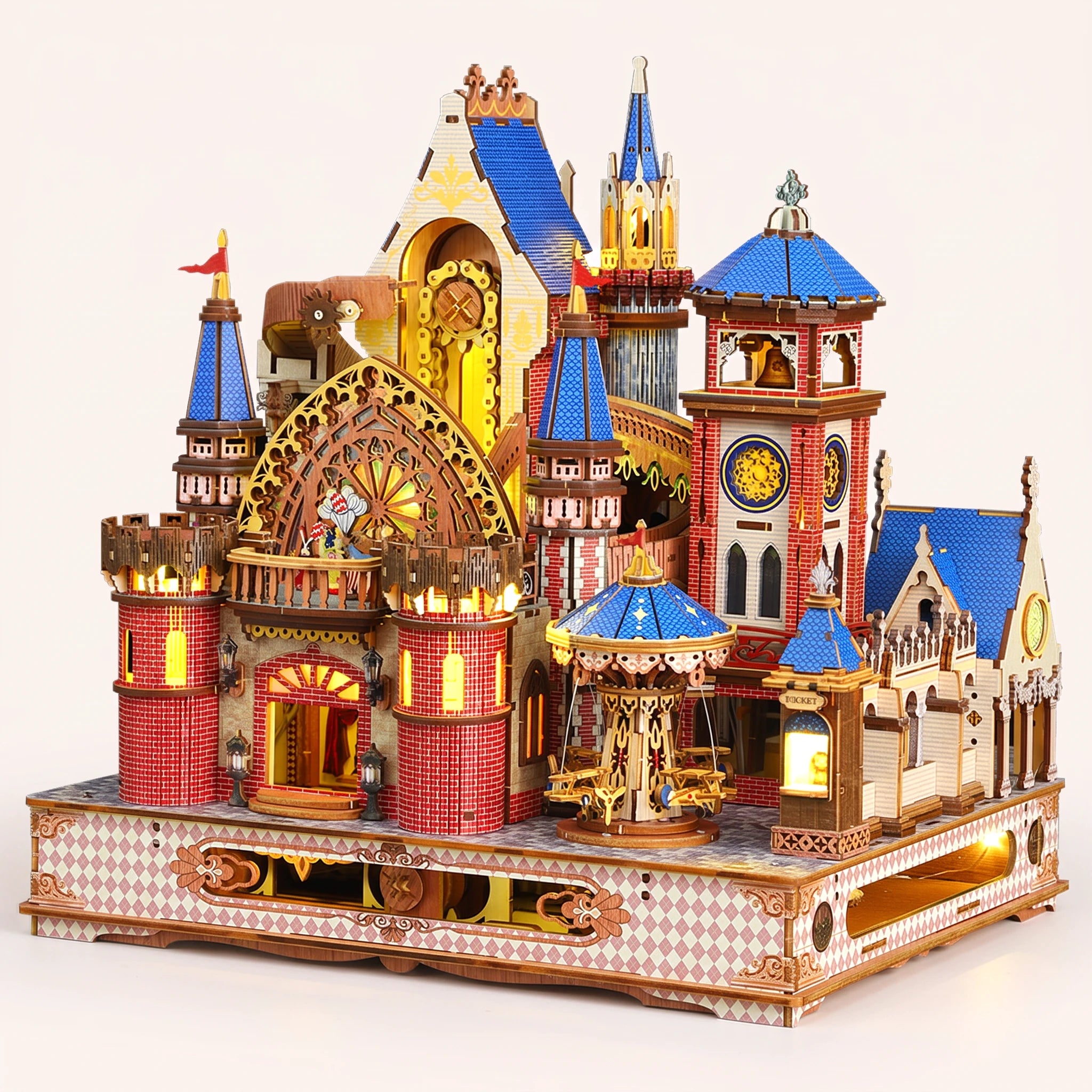 The Carousel Castle DIY miniature fairground castle kit, lights on, catalogue hero