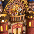 Macro of the balcony stage with rabbit, clown and teddy bear under the rose window