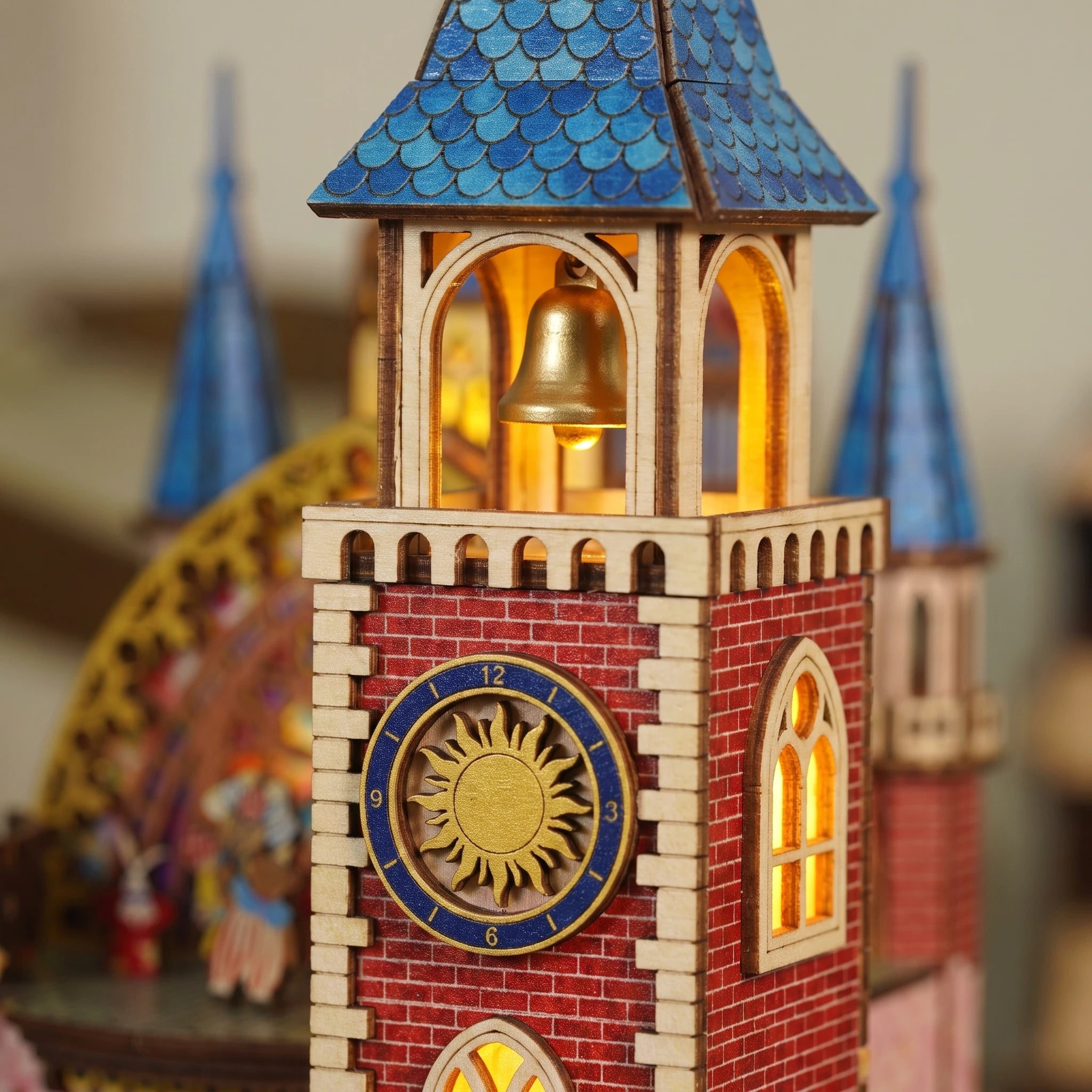 Macro of the clock tower with golden sun clock and bell