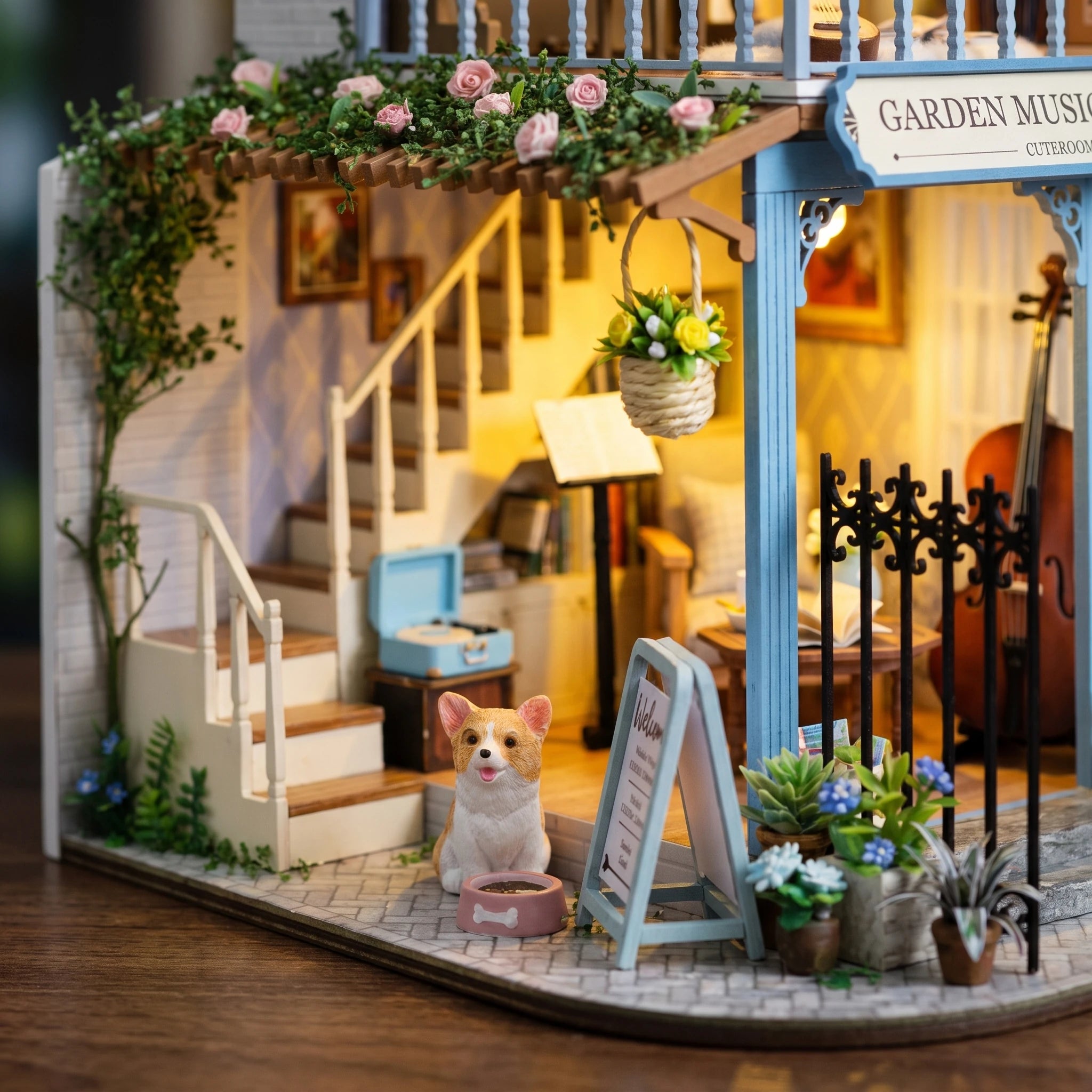 Porch detail: corgi by the welcome board under the rose pergola