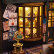 Macro of the curved shop window and brass celestial globe