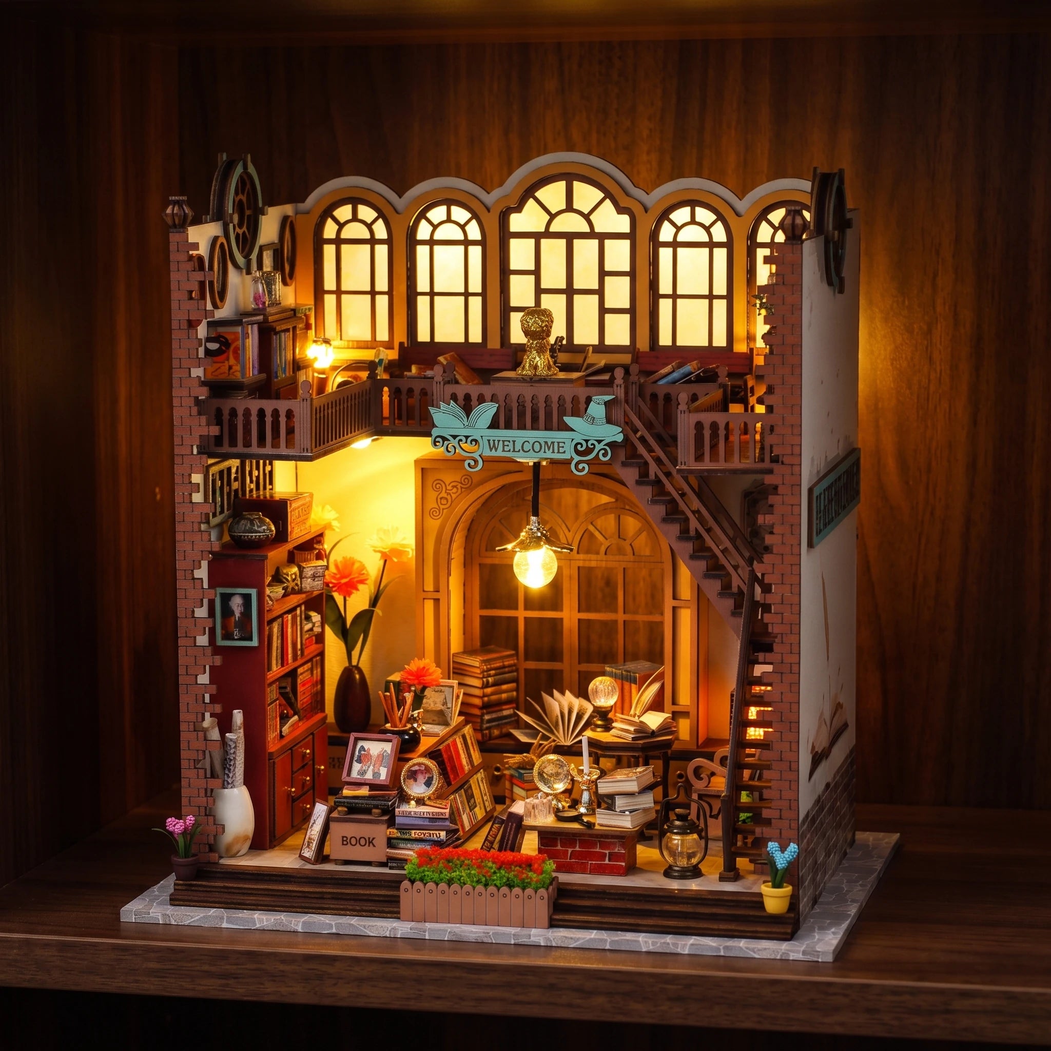 The Crystal Quill glowing on a dark walnut shelf at night