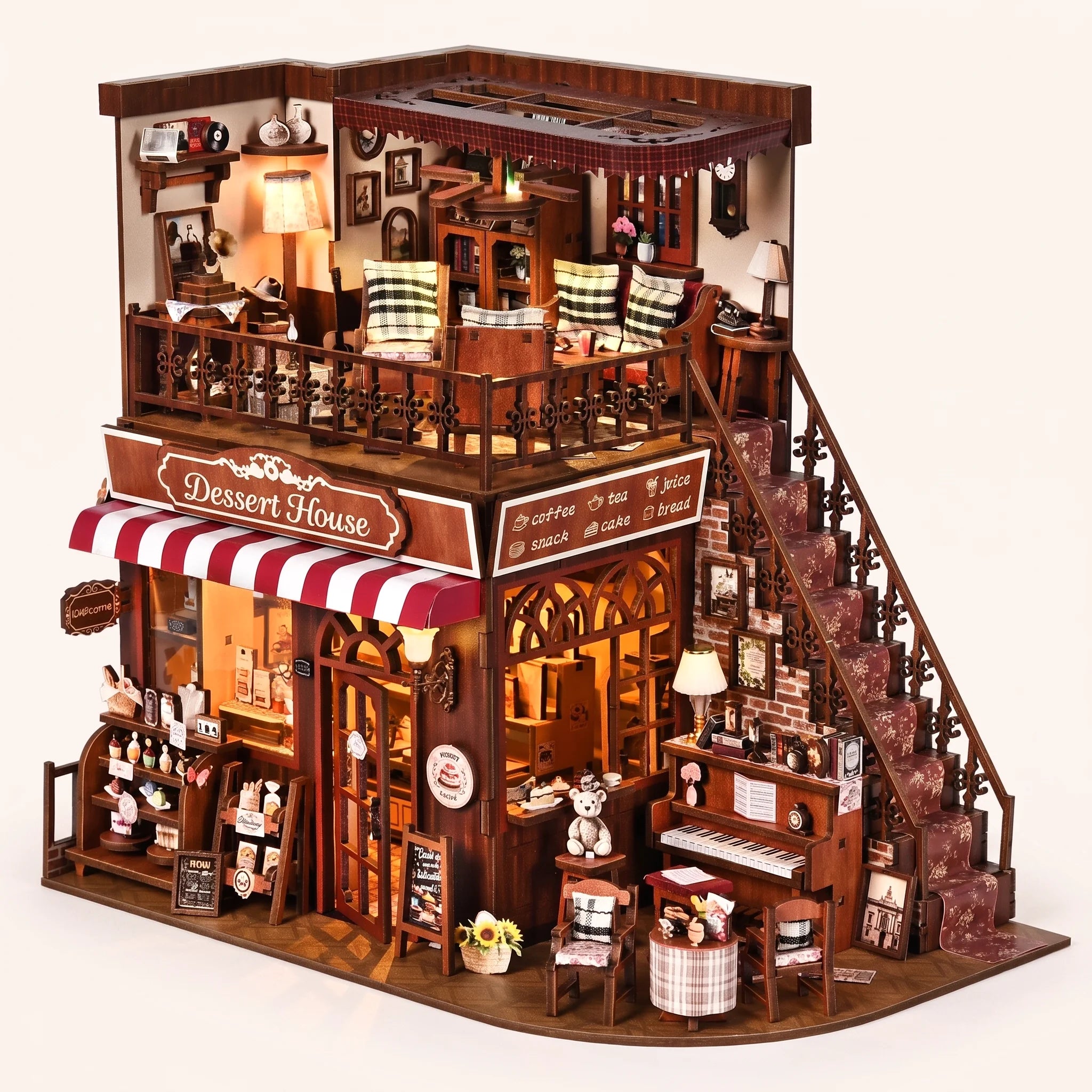 The Dessert House DIY miniature corner patisserie kit with LED lights on, blush studio hero
