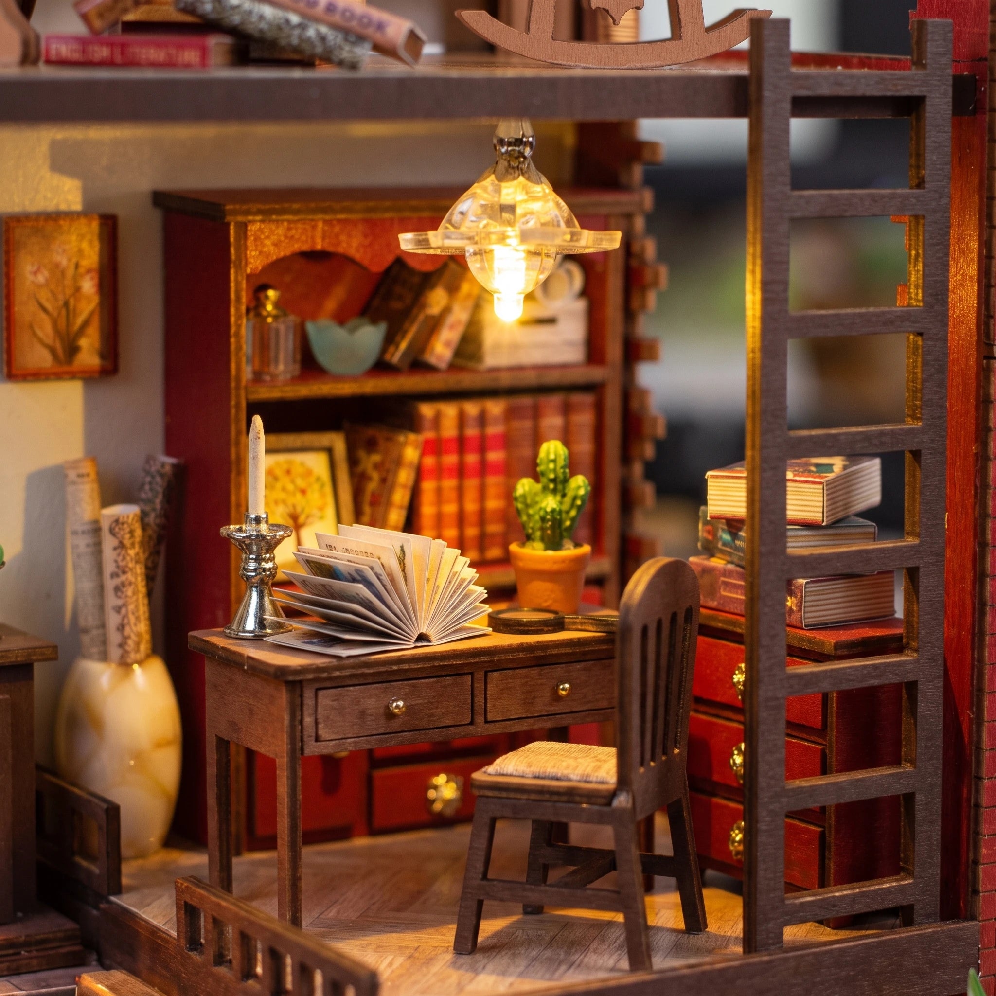 Macro of The Ember Loft writing loft with desk and pendant lamp