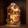 The Ember Loft glowing on a dark walnut shelf at night