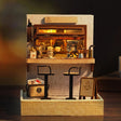 The Espresso Bar lit interior on a dark warm backdrop