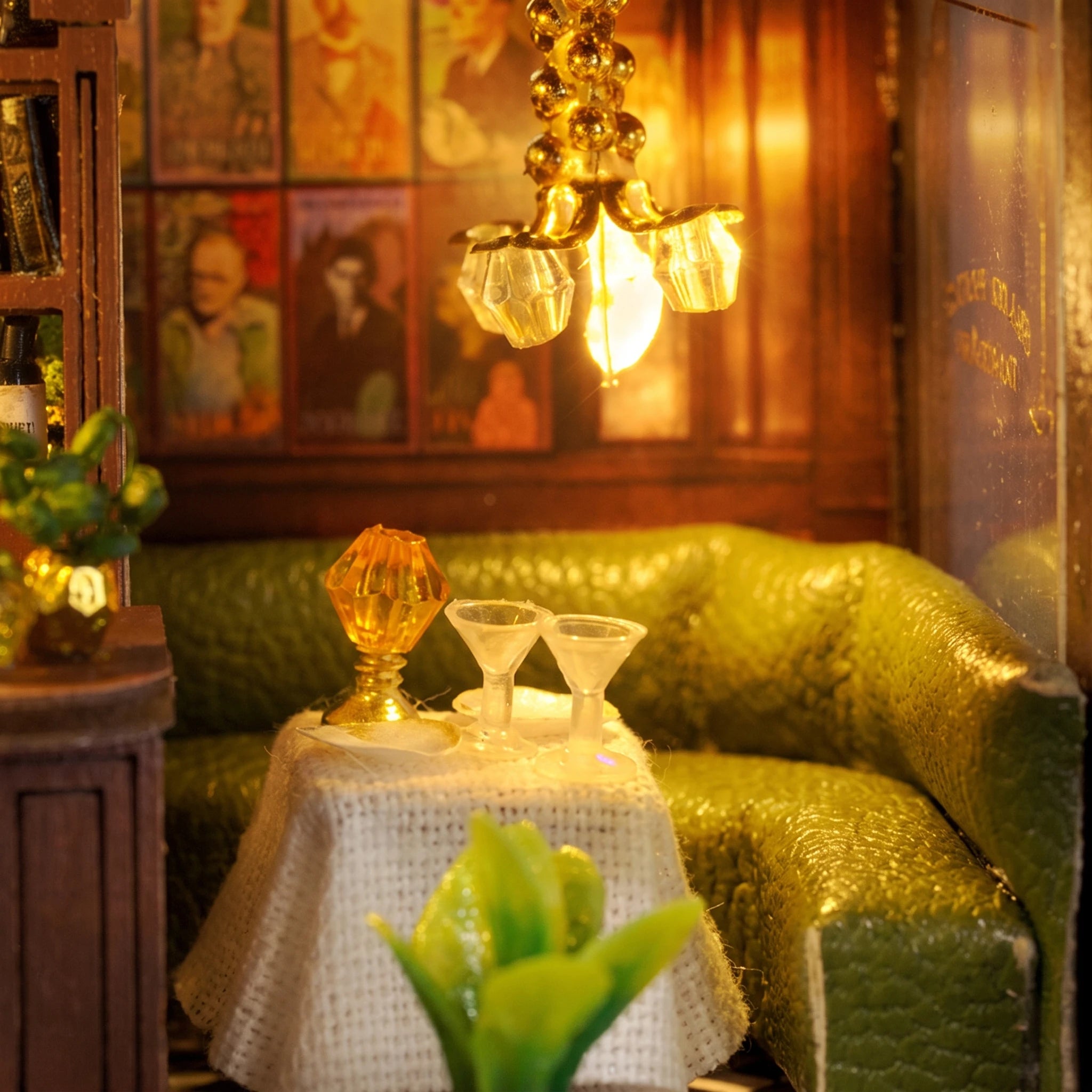 Booth detail: green leather booth and white-clothed table