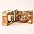 The Golden Crust DIY miniature bakery kit, assembled with LED lights on