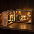 The Golden Crust glowing on a walnut shelf at night