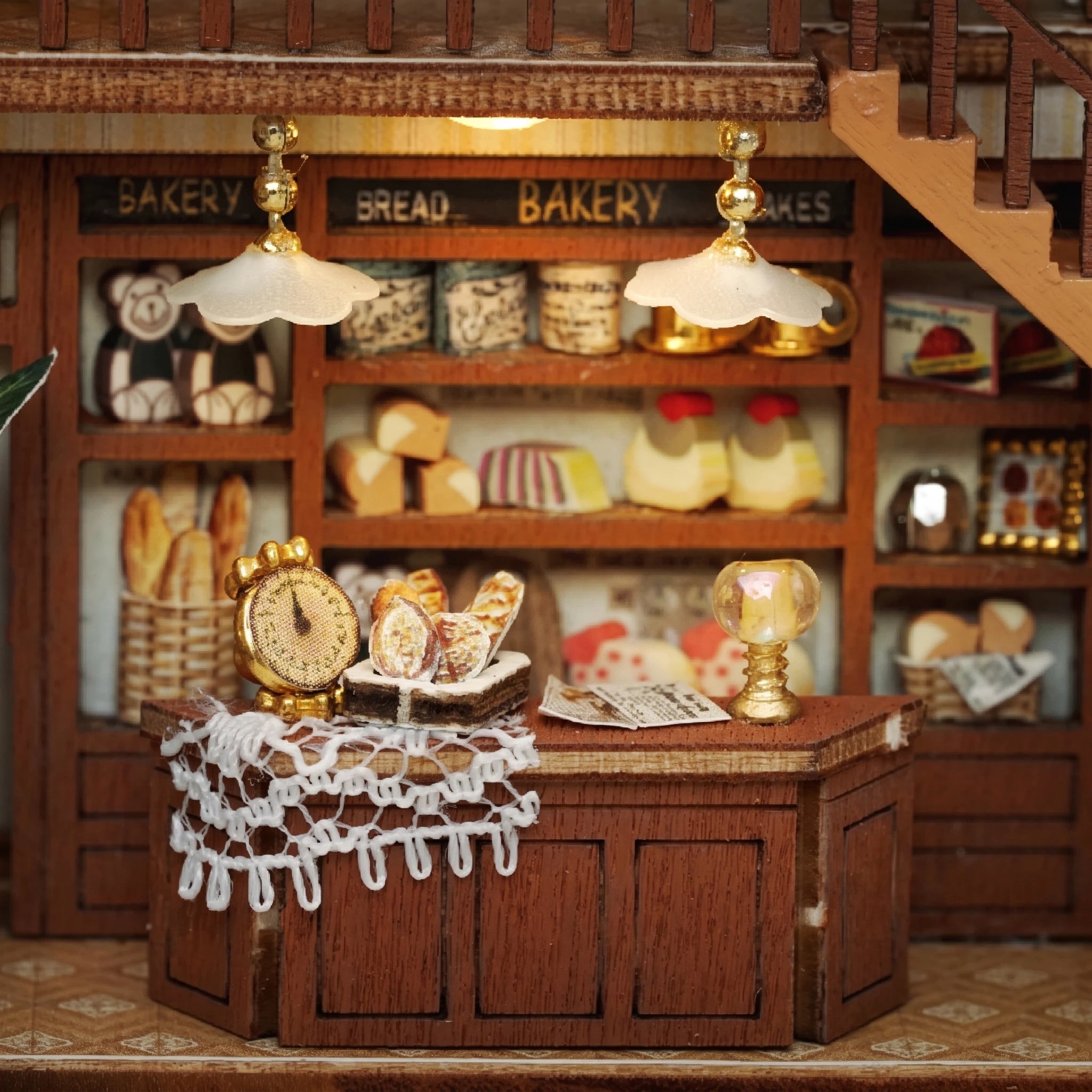 Bakery counter detail: lace cloth, golden scale and bread shelves