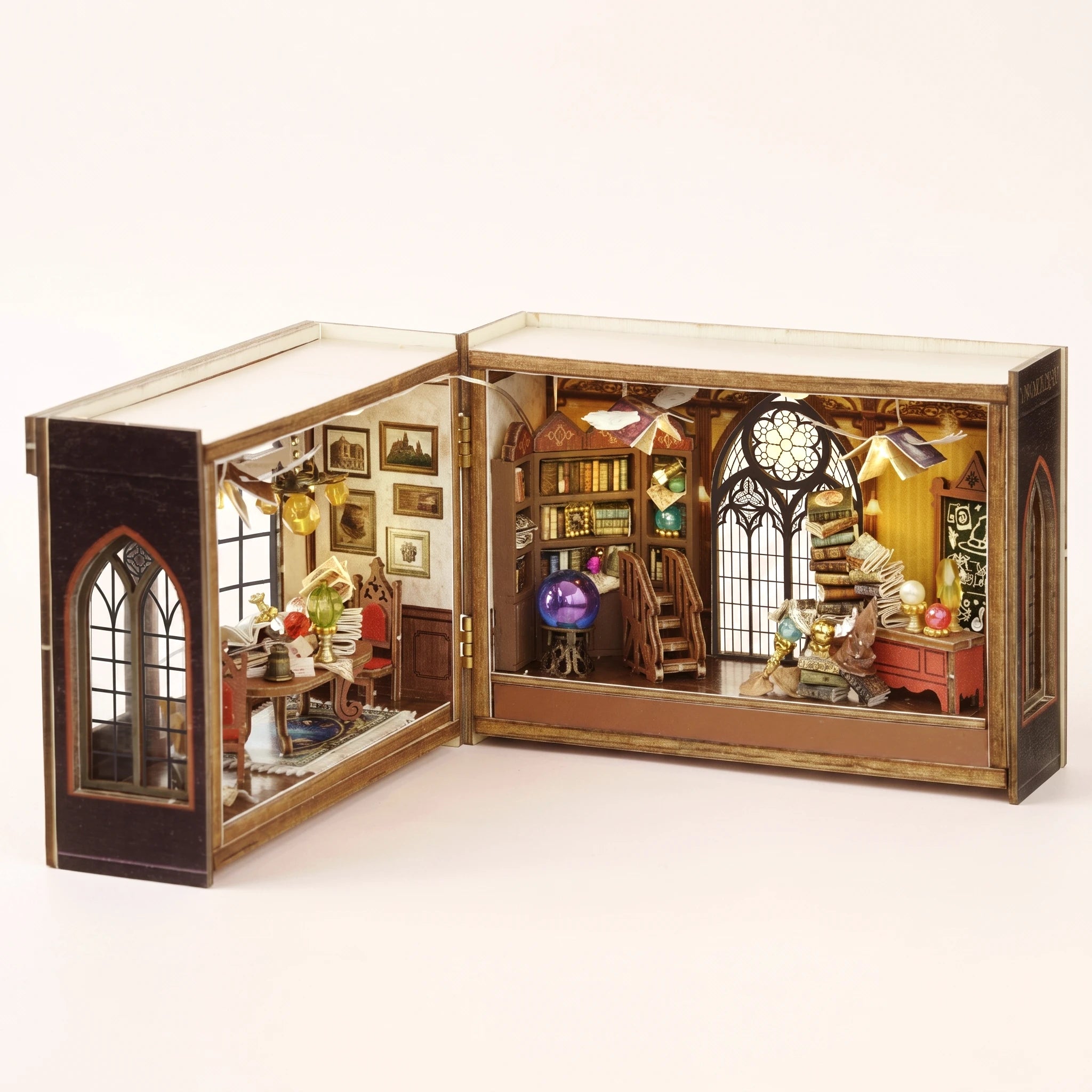 The Grimoire School DIY miniature magic school kit, assembled with LED lights on